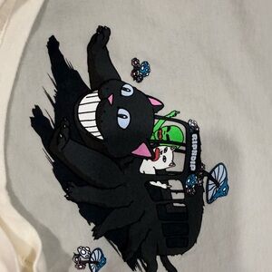 2 -Rip and DipBlack and White Cat Graphic Bird Toy and white Cat pocket shirts